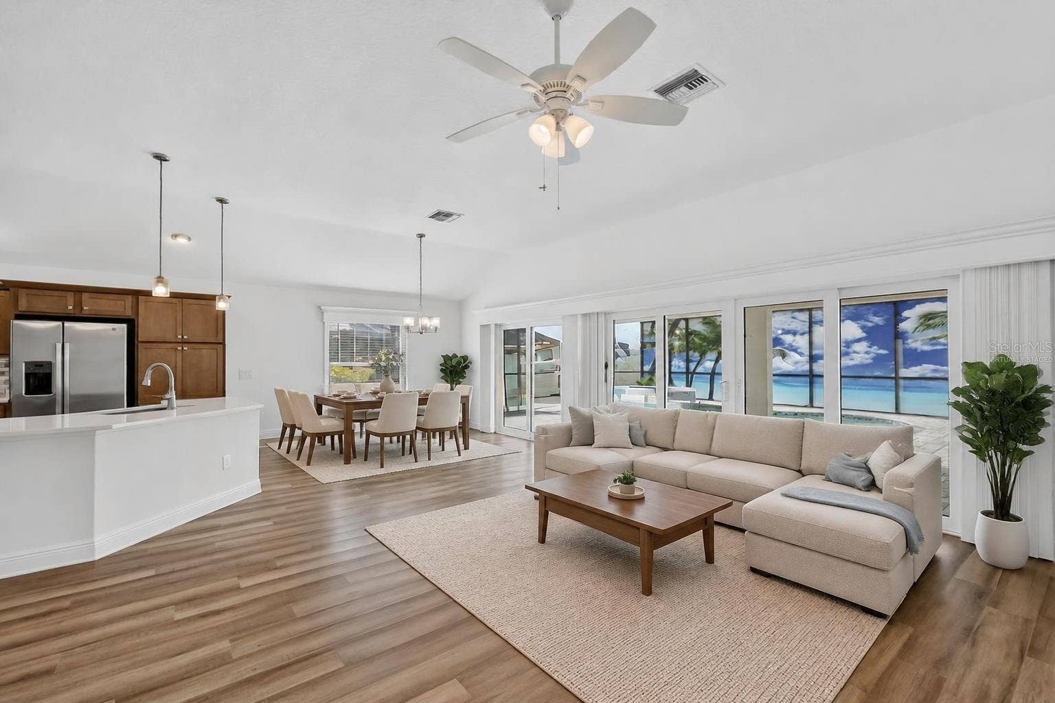 6996 DWIGHT DRIVE, The Villages, FL 34762 Living, Dining, and Kitchen-Virtually Staged