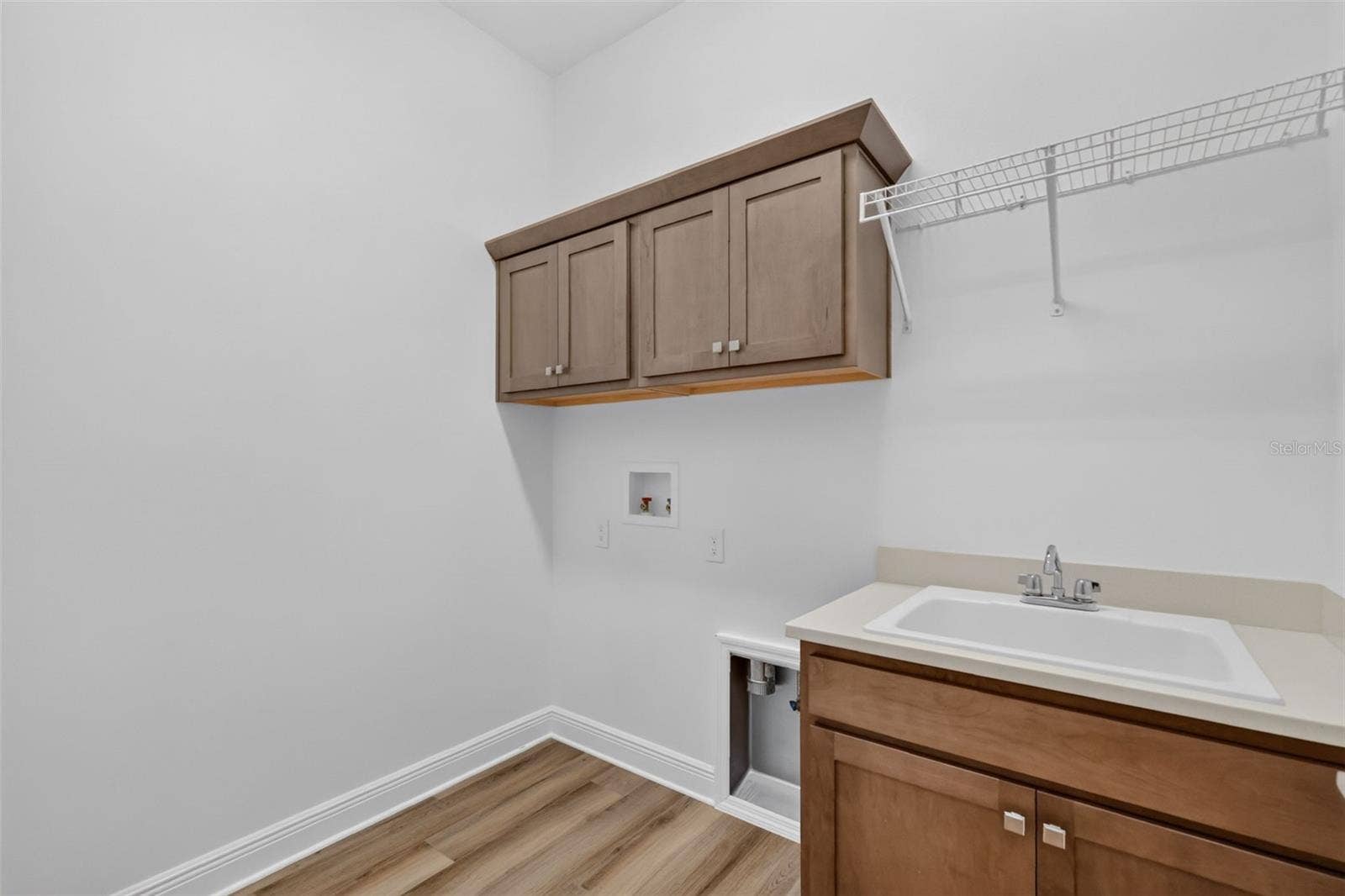 6996 DWIGHT DRIVE, The Villages, FL 34762 Interior Laundry Room