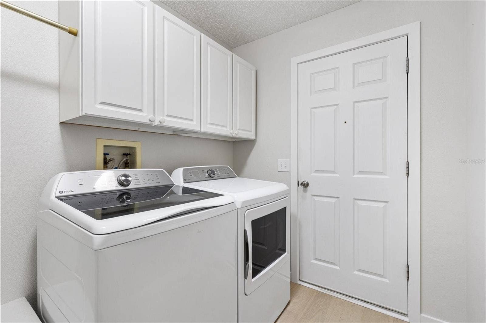 9595 SE 171ST ARGYLL STREET, The Villages, FL 32162 Inside Laundry Room