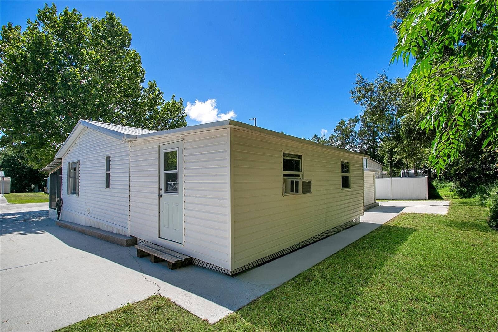 16905 SUGAR BERRY LANE, Montverde, FL 34756 Exterior Rear area