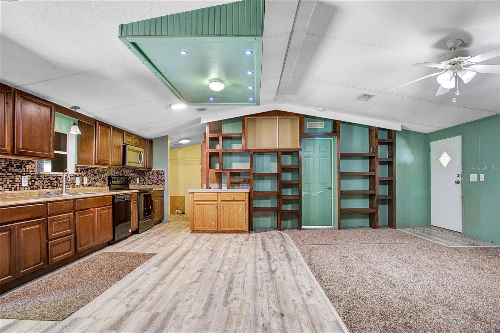 16905 SUGAR BERRY LANE, Montverde, FL 34756 Kitchen, Dining area & Living Room