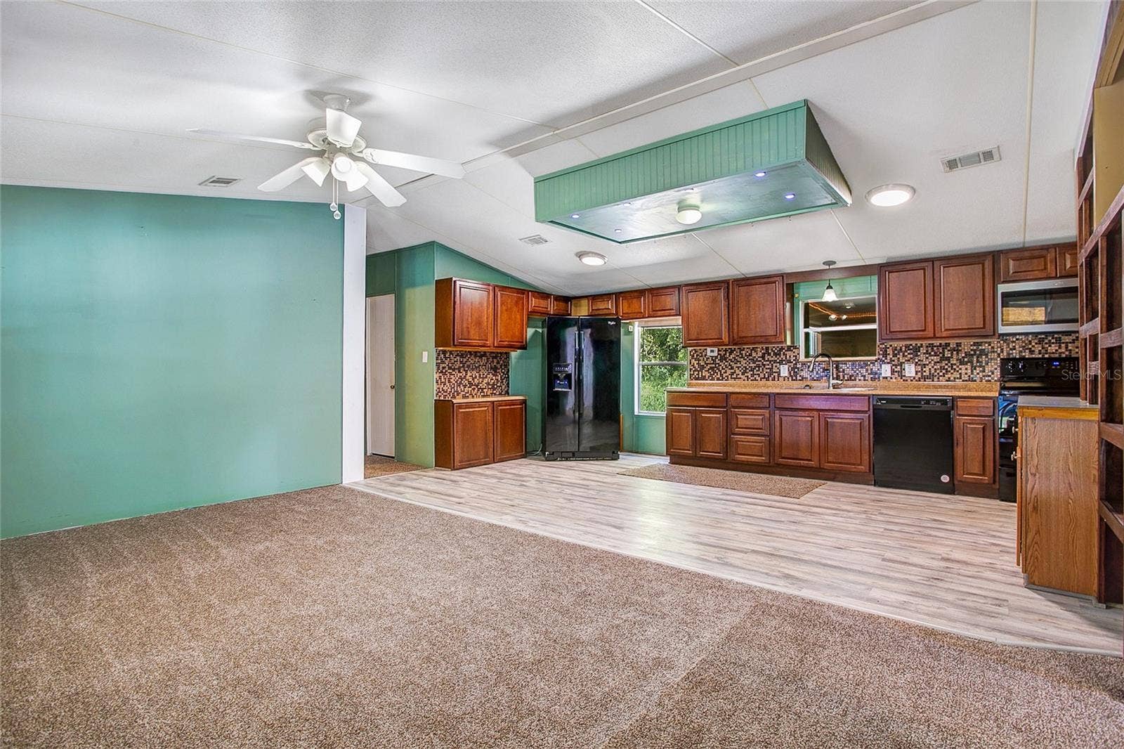 16905 SUGAR BERRY LANE, Montverde, FL 34756 Kitchen, Dining area & Living Room
