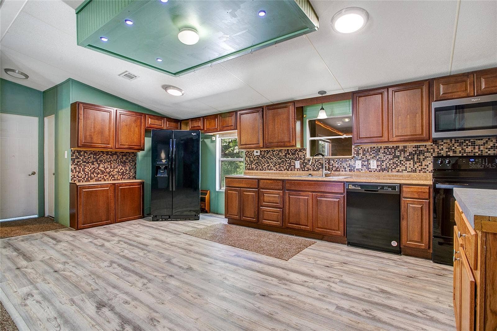 16905 SUGAR BERRY LANE, Montverde, FL 34756 Kitchen & Dining Area