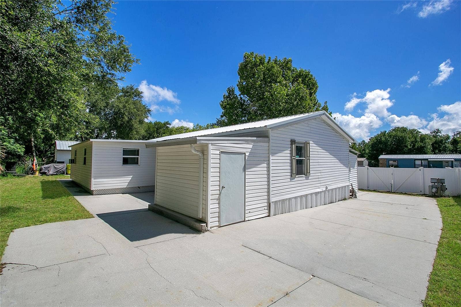 16905 SUGAR BERRY LANE, Montverde, FL 34756 Exterior Rear Utility Shed