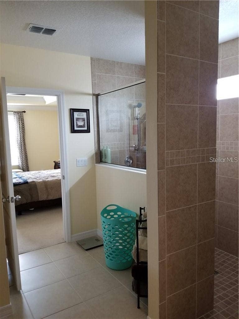 view from master bath to bedroom