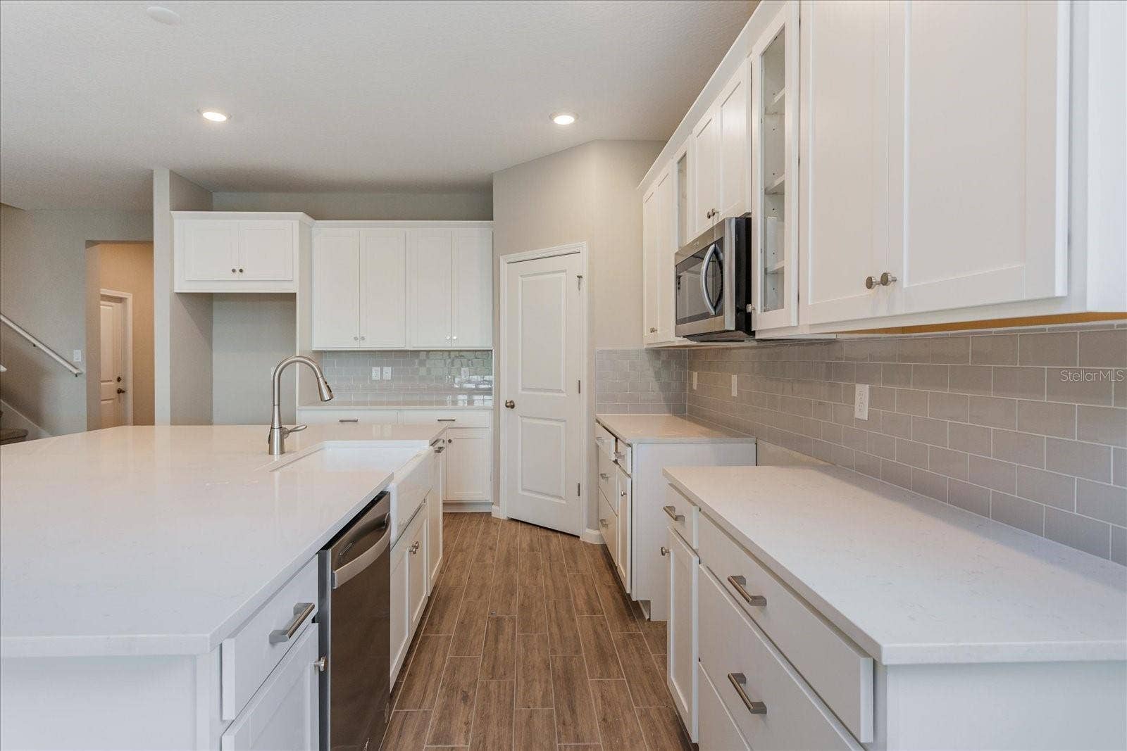 13326 PEACEFUL MELODY DRIVE, Winter Garden, FL 34787 Note: The sample photos included are of the model home and are meant to showcase the craftsmanship and design quality.