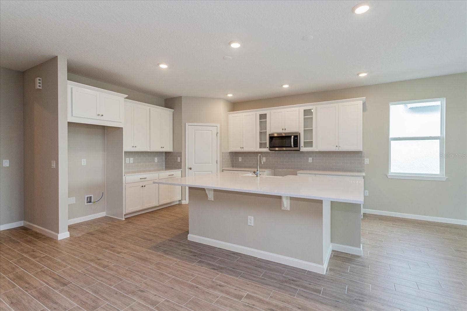 13326 PEACEFUL MELODY DRIVE, Winter Garden, FL 34787 Note: The sample photos included are of the model home and are meant to showcase the craftsmanship and design quality.