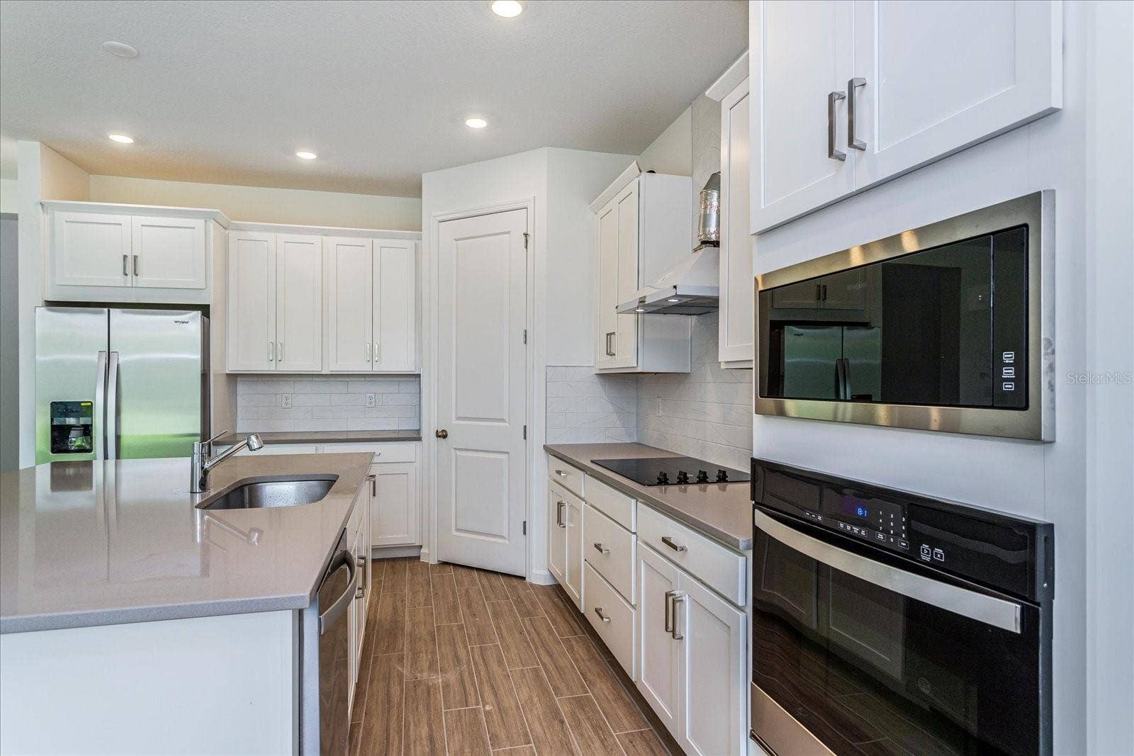 13344 PEACEFUL MELODY DRIVE, Winter Garden, FL 34787 Note: The sample photos included are of the model home and are meant to showcase the craftsmanship and design quality.