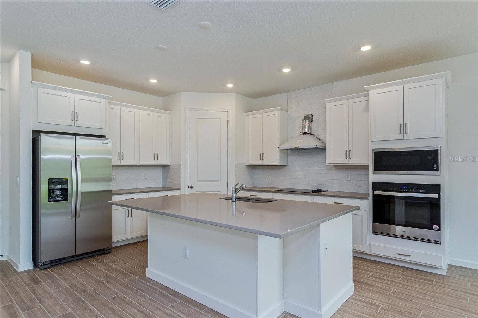 13344 PEACEFUL MELODY DRIVE, Winter Garden, FL 34787 Note: The sample photos included are of the model home and are meant to showcase the craftsmanship and design quality.