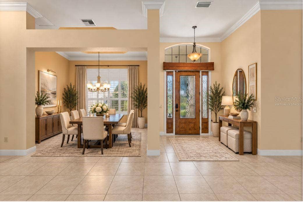 Virtually staged formal dining room.