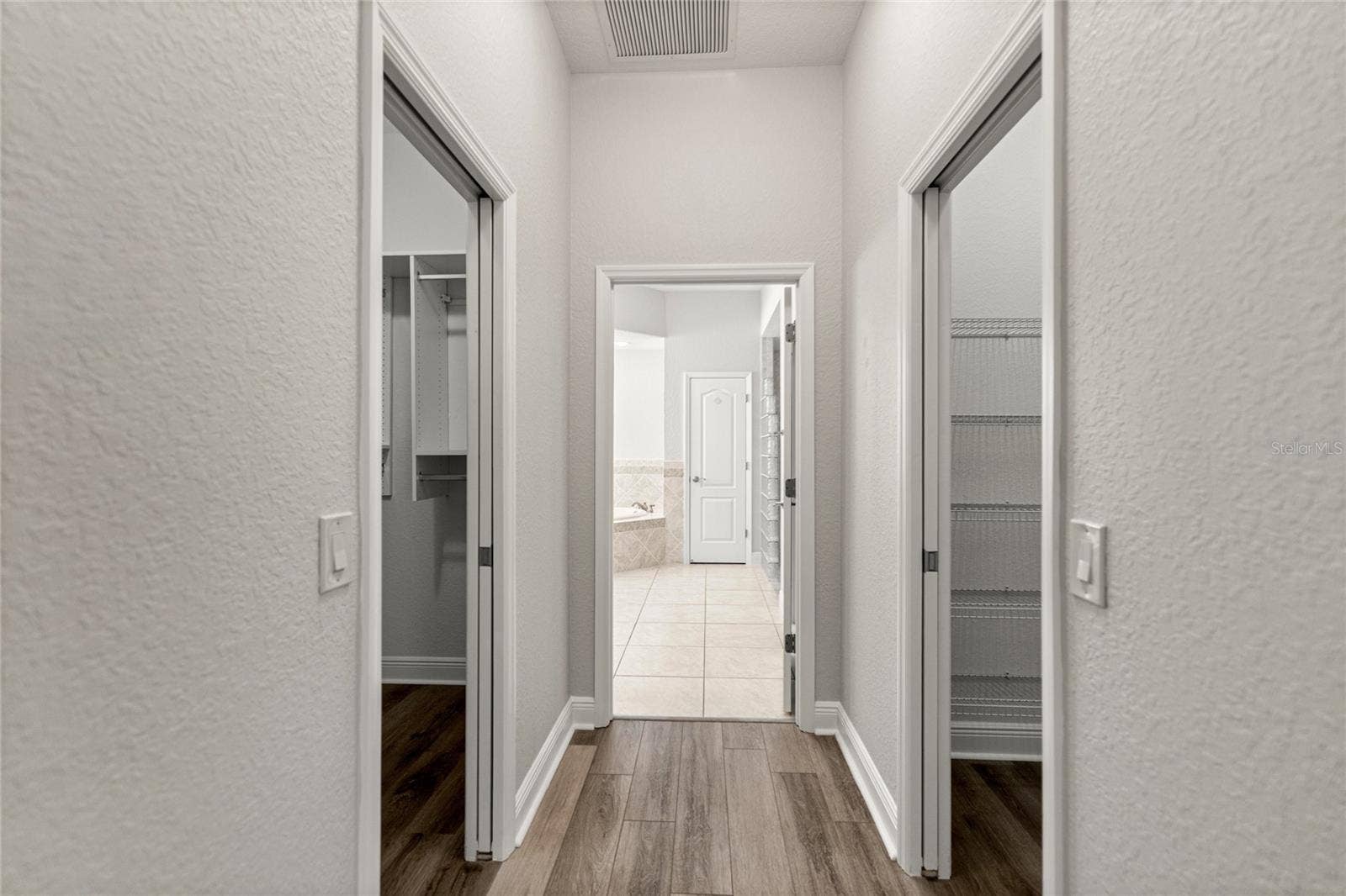 Hallway master closets.