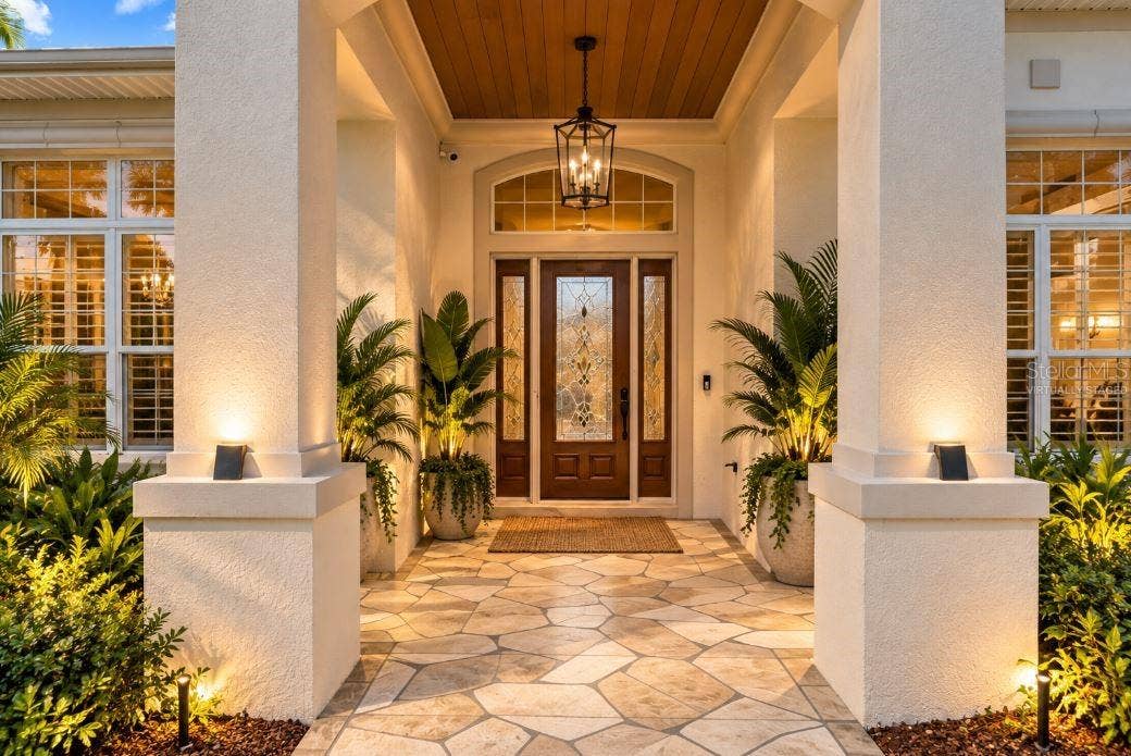 Virtually staged ST. CHARLES PREMIER POOL HOME.