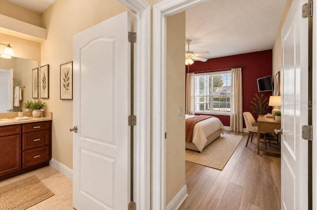 Virtually staged Hallway to guest bathroom/bedroom/office.