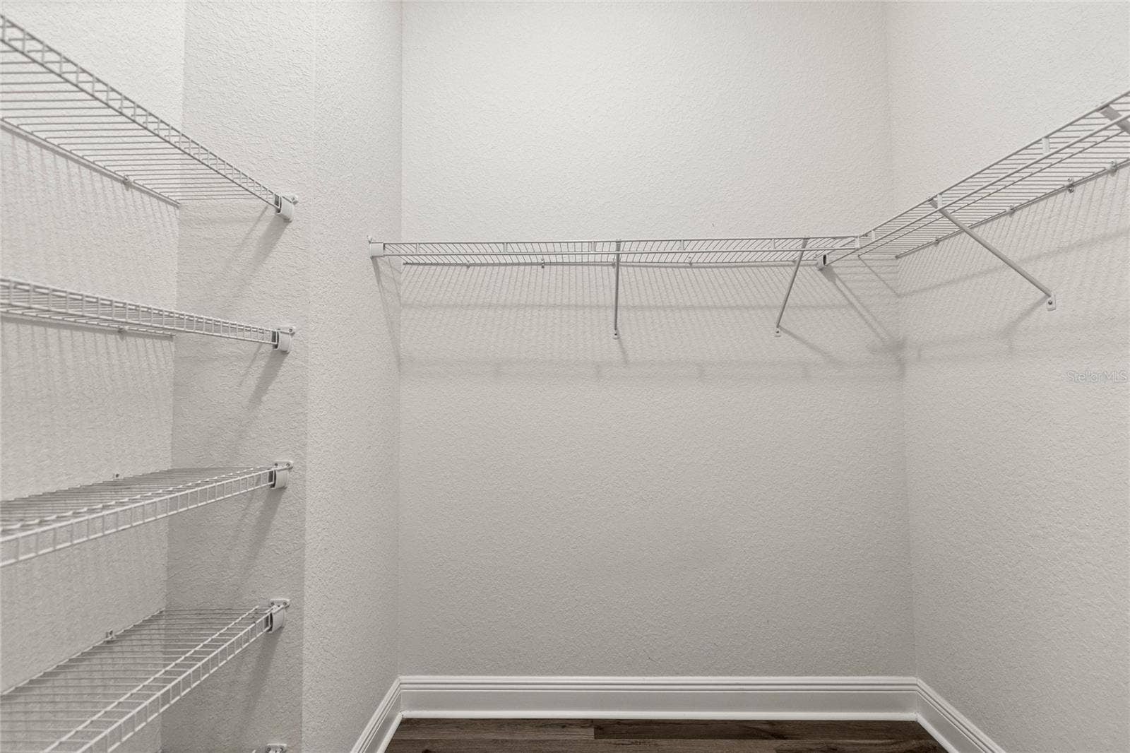 His Walk-In Closet.