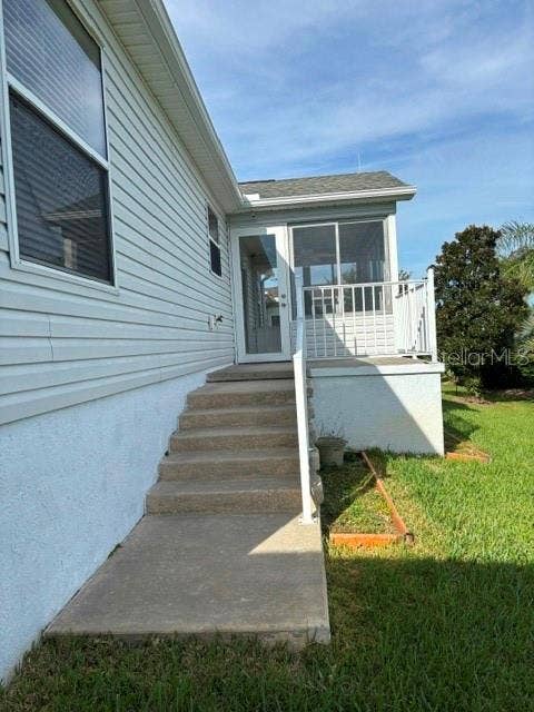 287 MERCER WAY, The Villages, FL 32162 Steps to patio and enclosed lanai