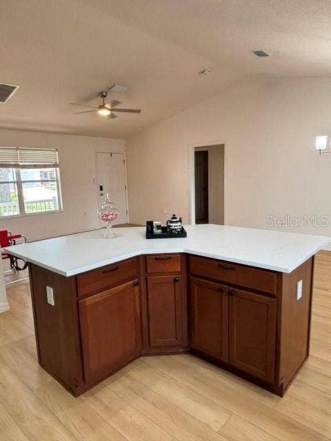 287 MERCER WAY, The Villages, FL 32162 Kitchen is open concept with the living room and dining room