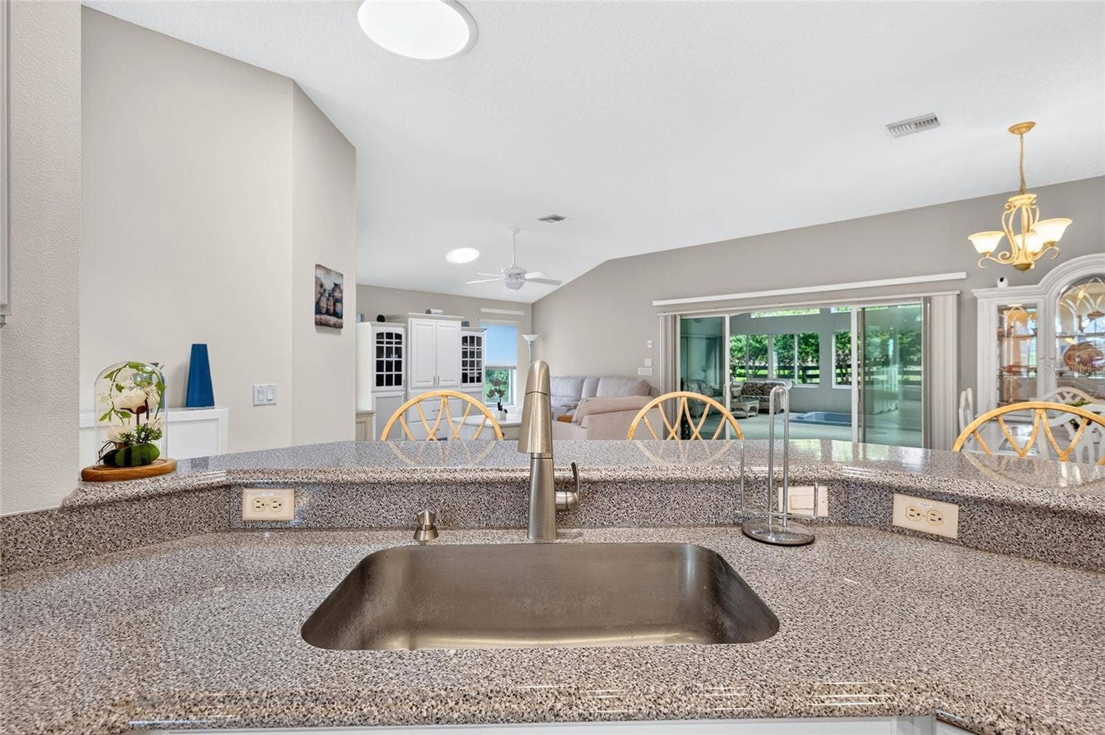 9245 SE 169TH BENTLEY STREET, The Villages, FL 32162 VIEW TO OPEN LIVING ROOM AND DINING ROOM