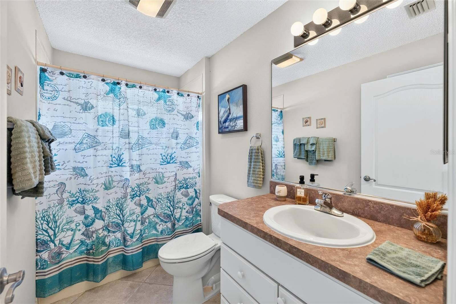 9245 SE 169TH BENTLEY STREET, The Villages, FL 32162 GUEST BATHROOM
