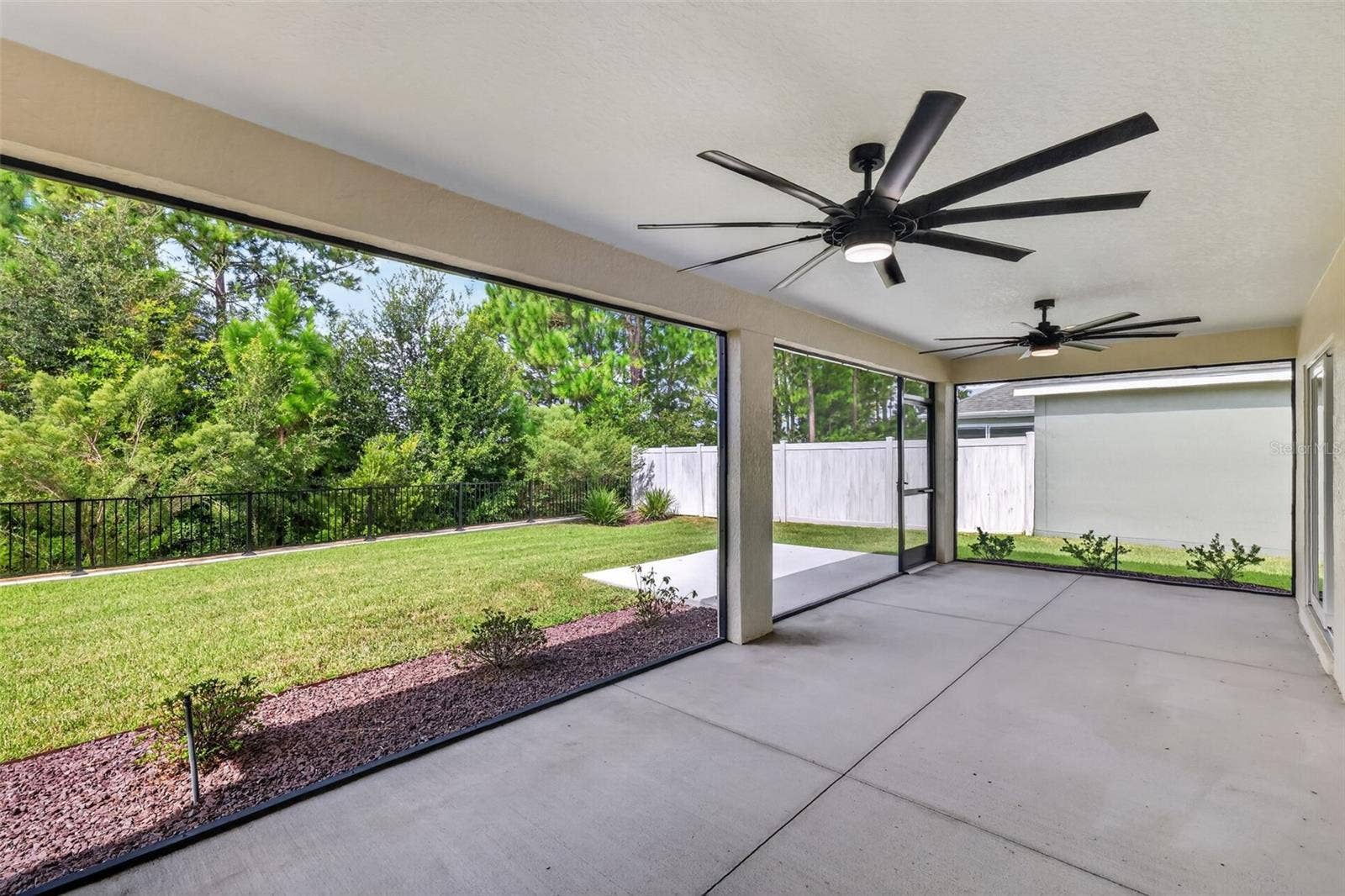 Expansive 28'x11' Lanai with Serene Eagle Preserve Views and PRIVACY Fencing
