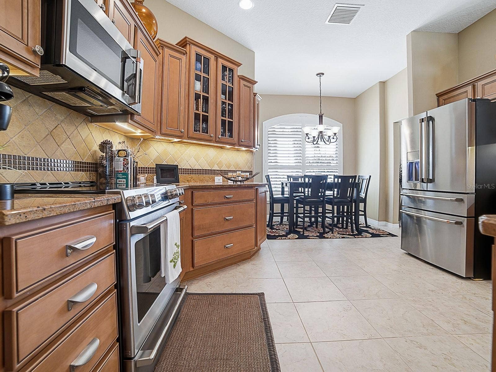 2269 KINCORD COURT, The Villages, FL 32162 Kitchen view looking toward front of home