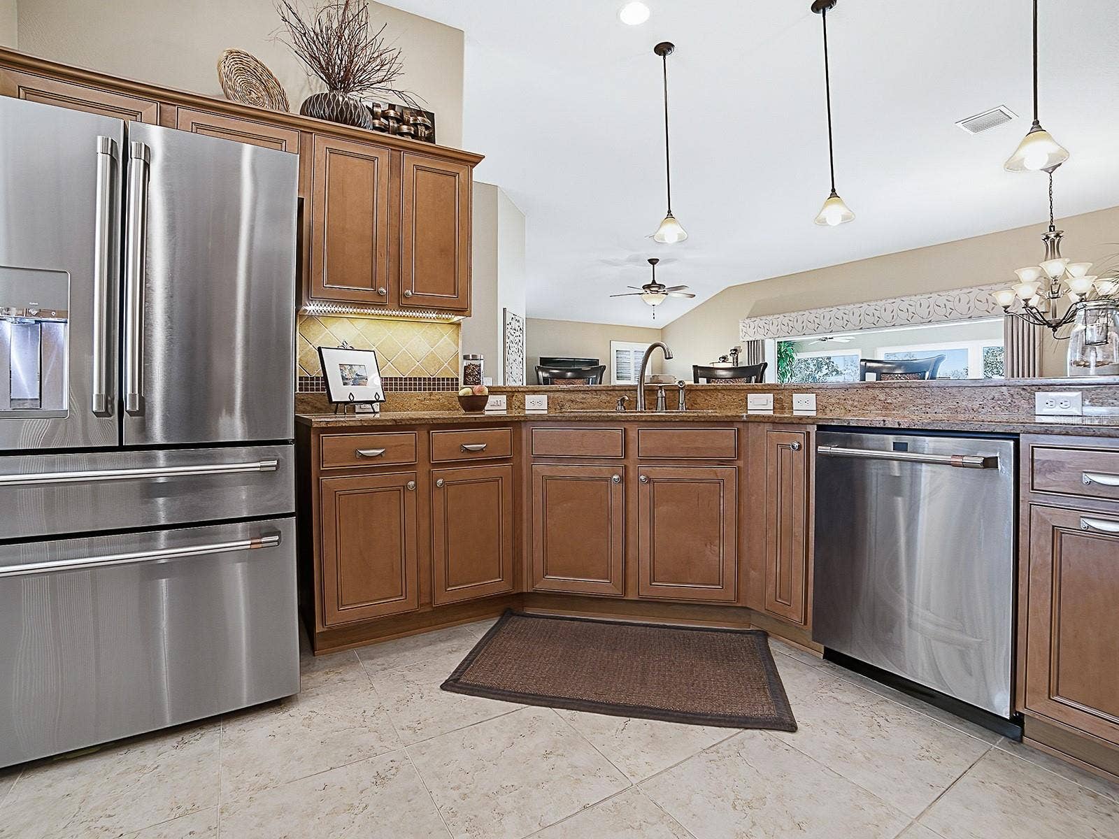 2269 KINCORD COURT, The Villages, FL 32162 Kitchen View looking toward back of home, beautiful cabinets, zoom in on these