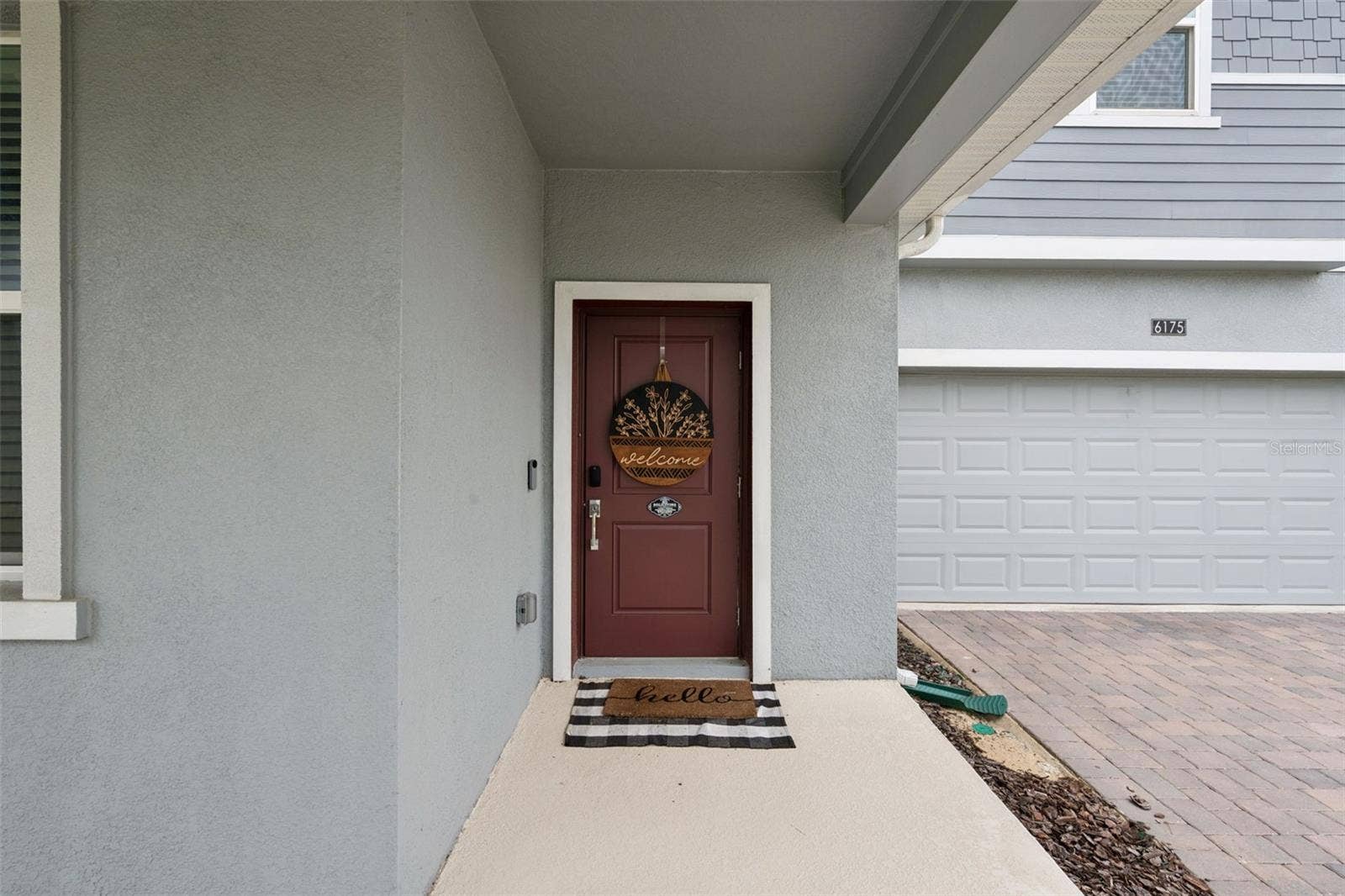 6175 SHAVASANA RD ROAD, Clermont, FL 34714 Covered entryway