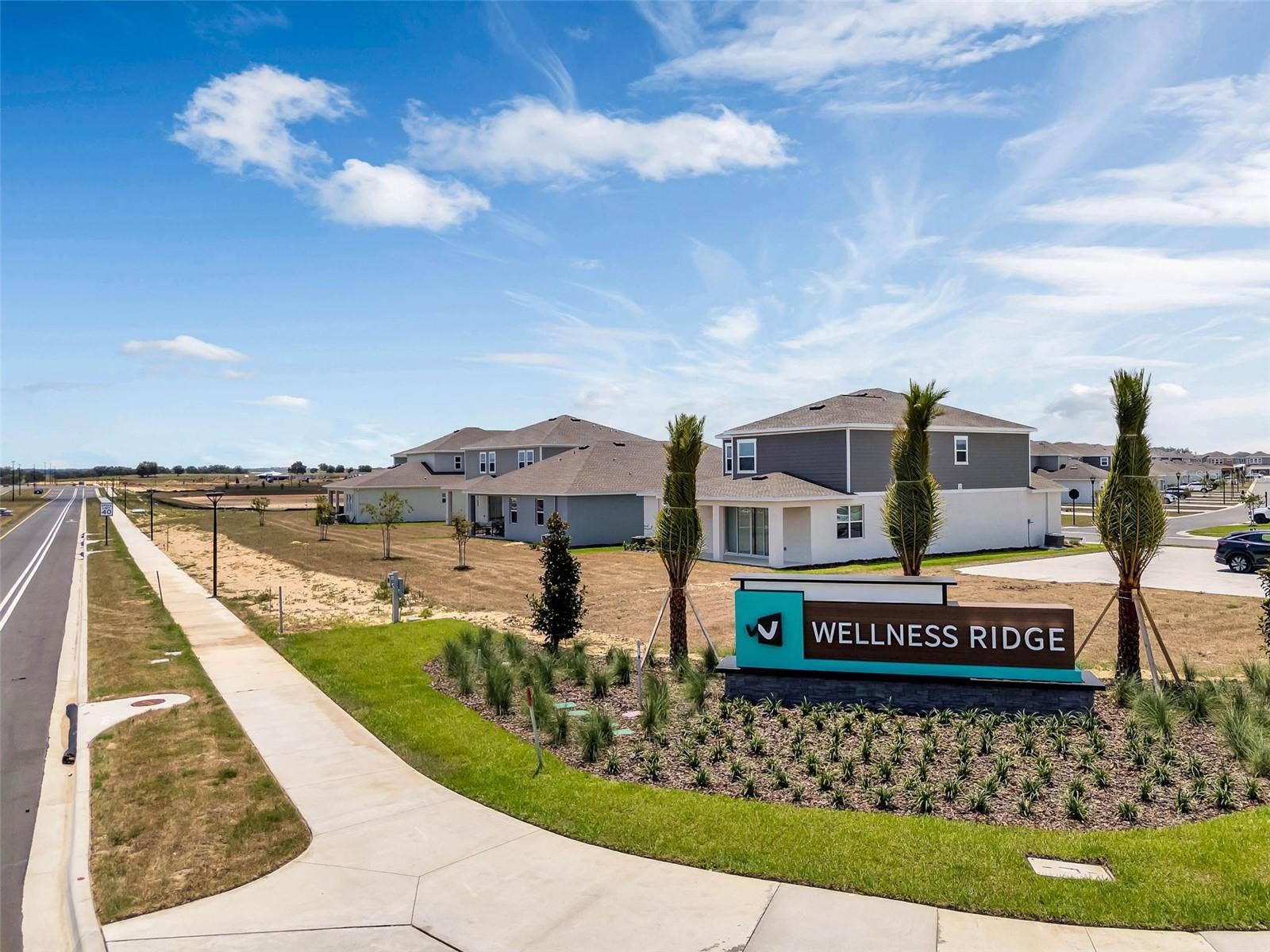 6175 SHAVASANA RD ROAD, Clermont, FL 34714 Wellness Way entry into the community