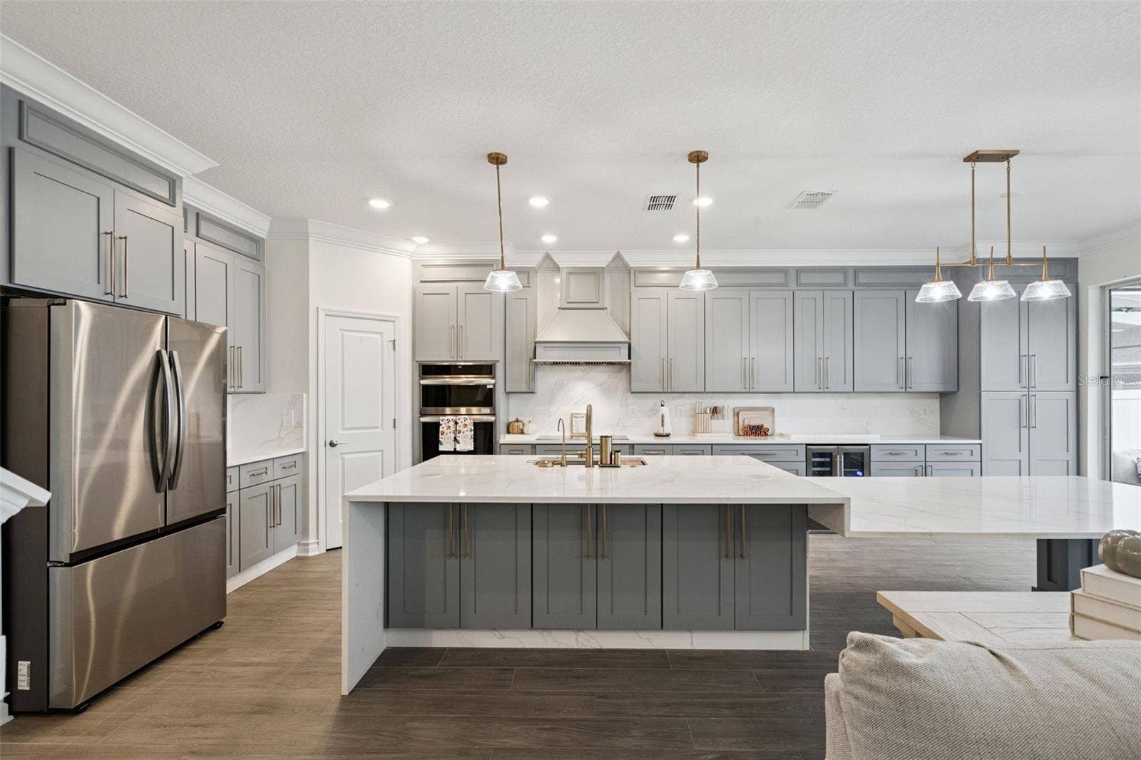 6175 SHAVASANA RD ROAD, Clermont, FL 34714 Different kitchen angles showing the abundance of custom cabinets