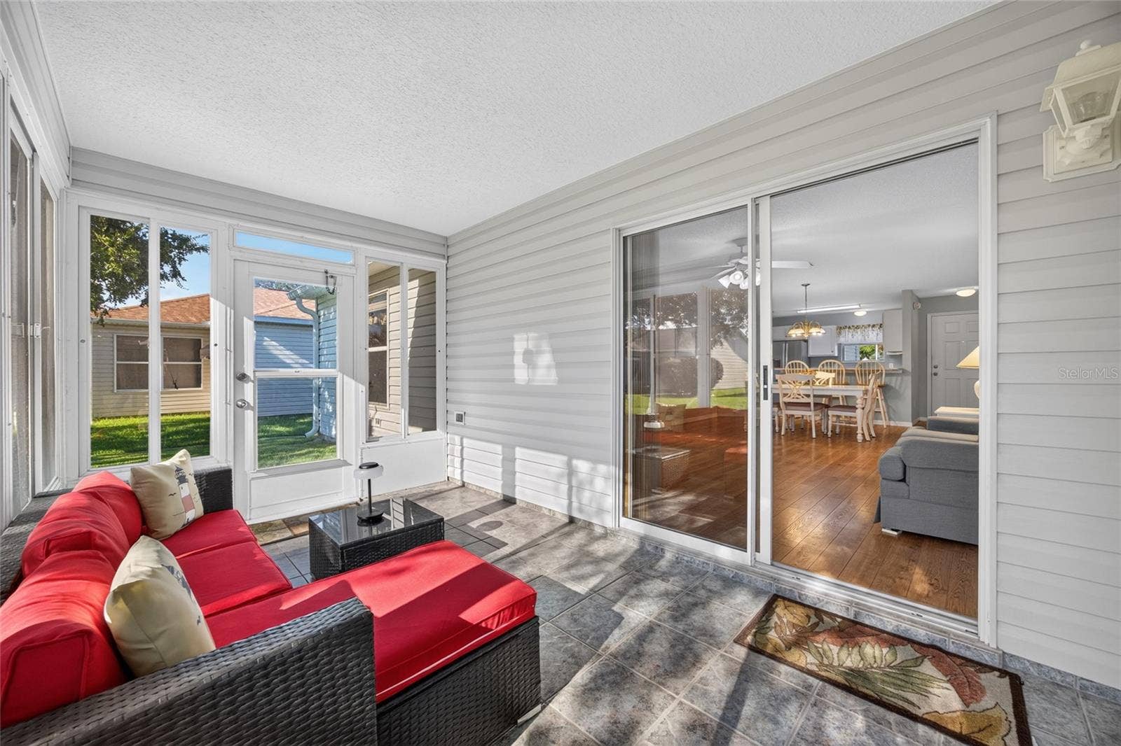 Enclosed Lanai & Slider to Living Room