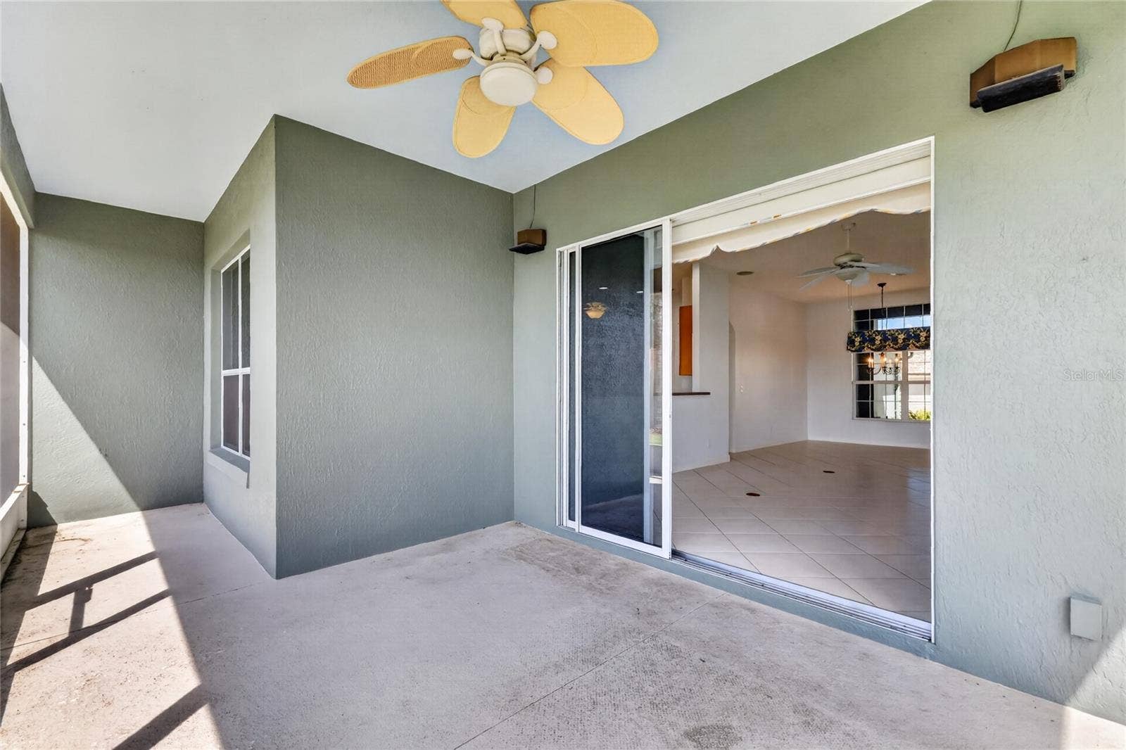 Enjoy the screened lanai on cool days, with a view of the lake.