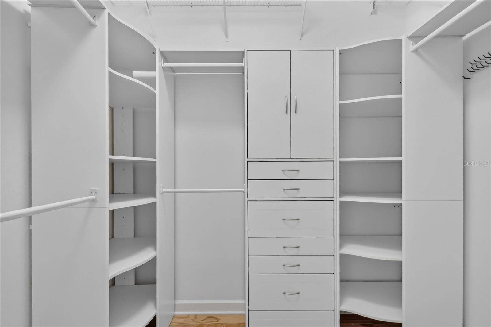 Closet organizers have been installed in the primary closet.
