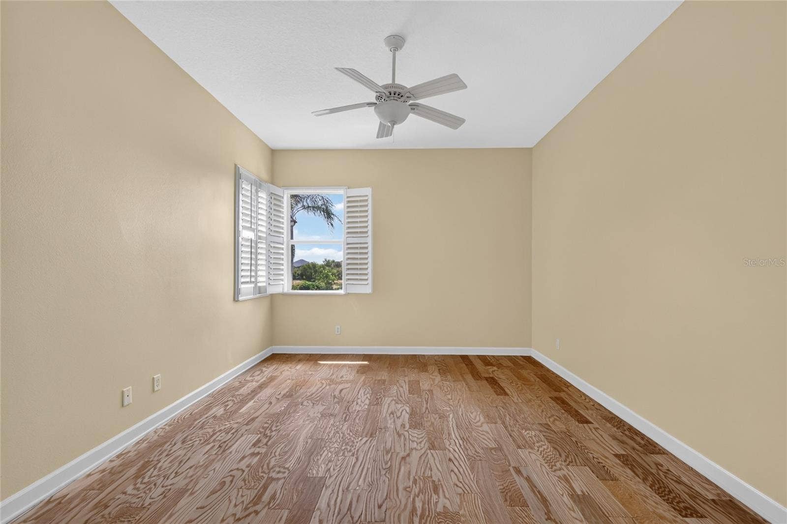 The primary suite has a view of the lake.