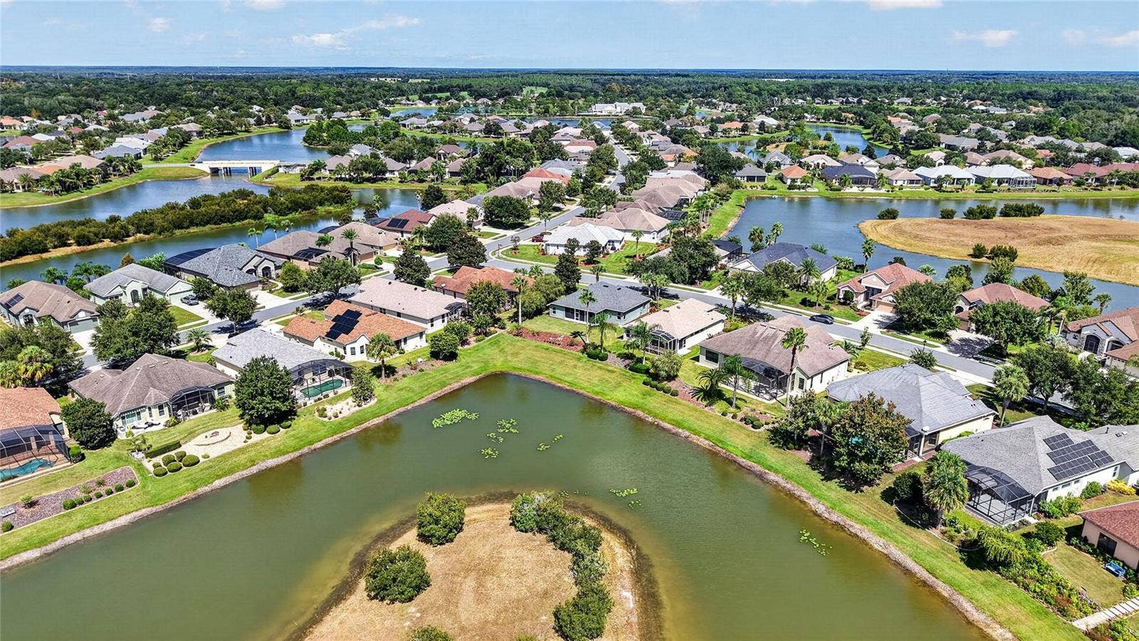 Rear arial view of 7887 Crosswinds Way and surrounding homes.