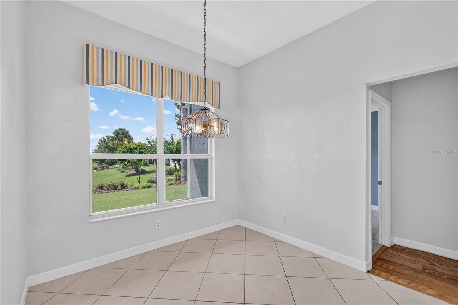 The secondary bedrooms and bathroom are tucked behind the kitchen.