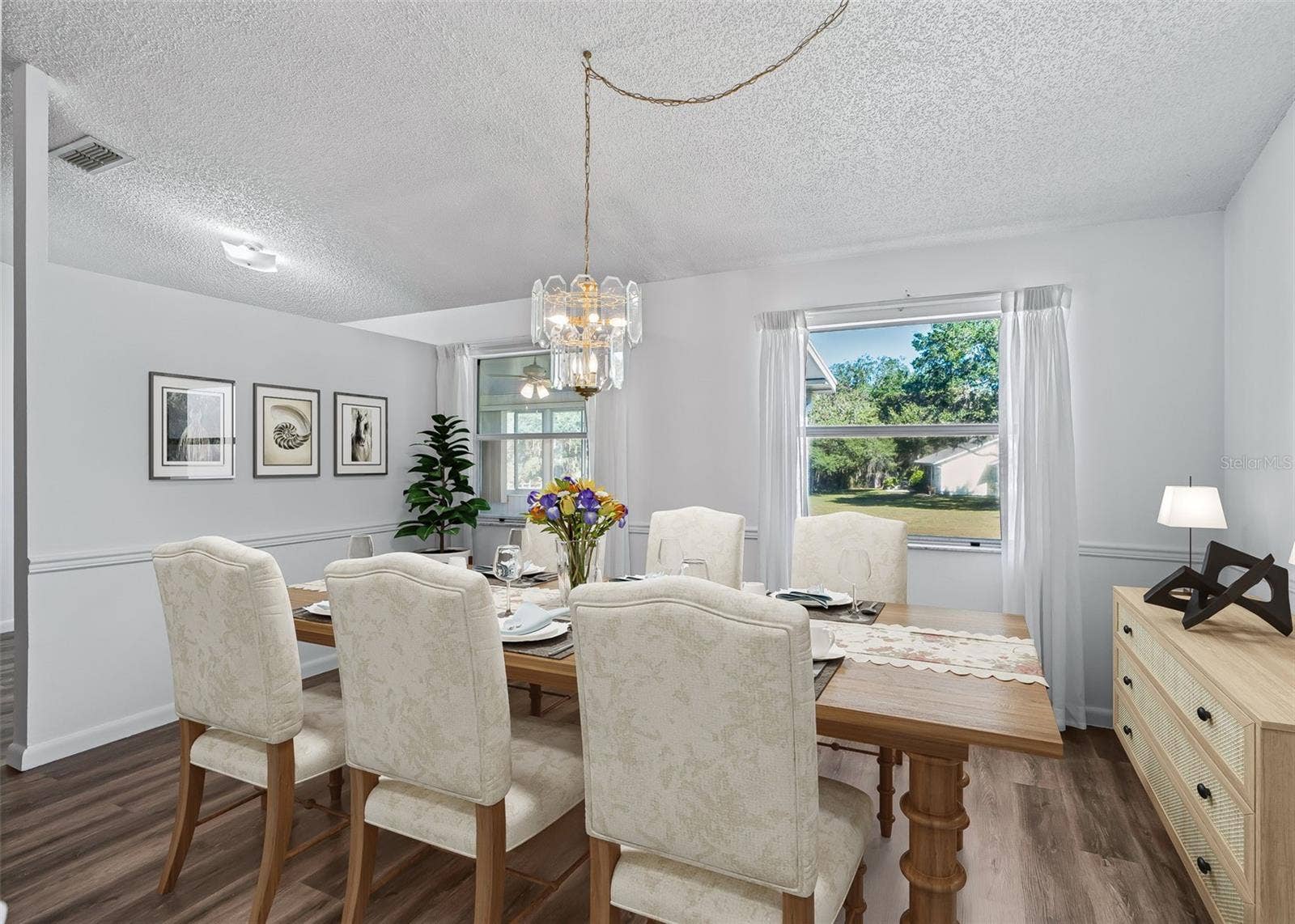 1409 NEW ABBEY AVENUE, Leesburg, FL 34788 STAGED DINING ROOM