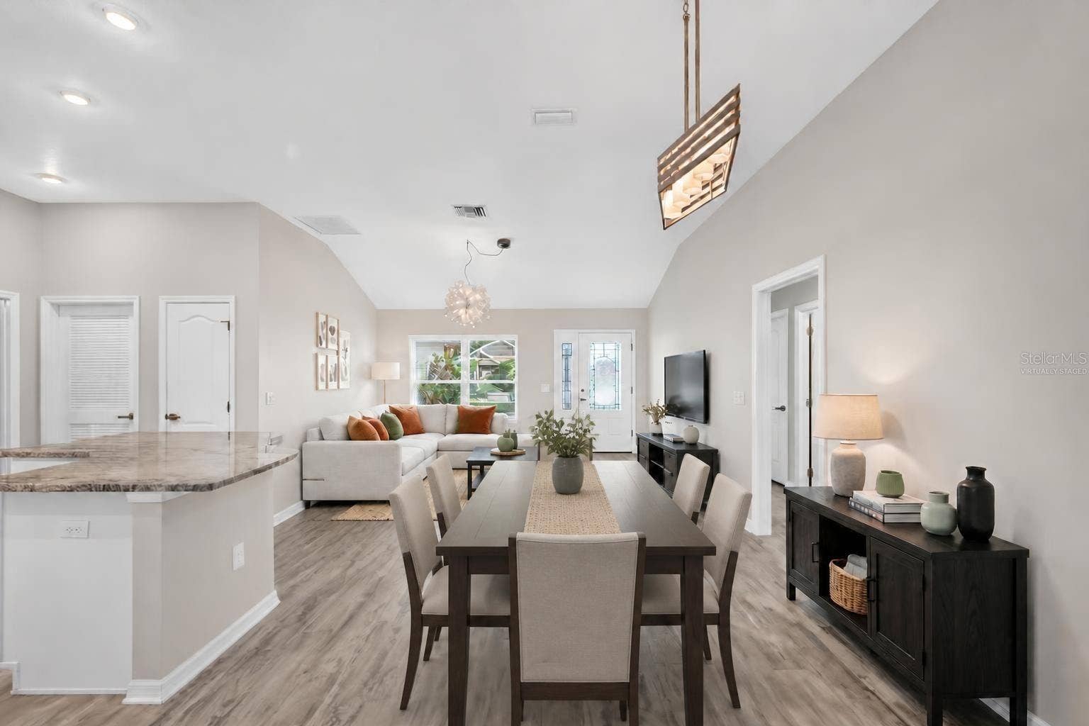 3254 ZIPPERER WAY, The Villages, FL 32163 Living, Dining, and Kitchen-Virtually Staged