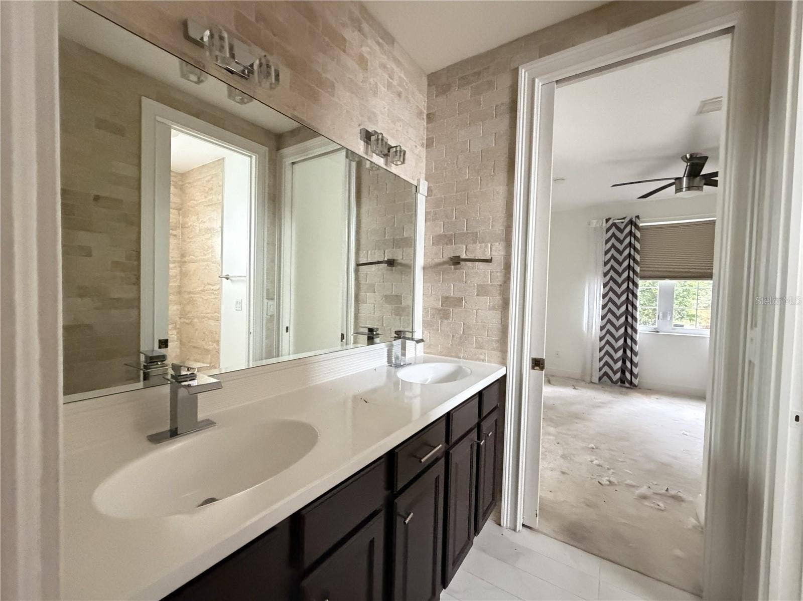39539 HARBOR HILLS BOULEVARD, Lady Lake, FL 32159 Second full bathroom with dual sinks and extended vanity.