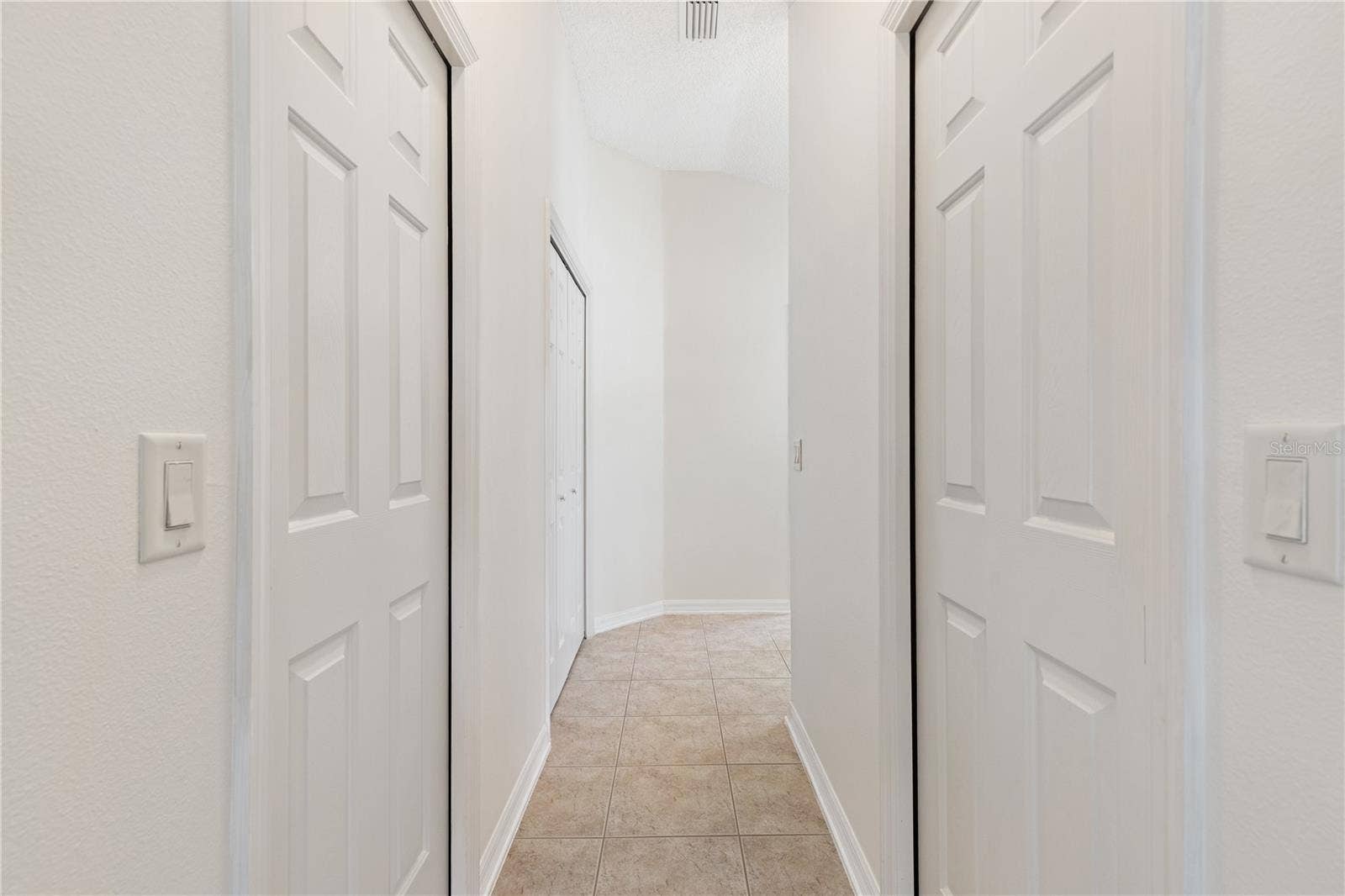 HIS & HERS WALK IN CLOSETS