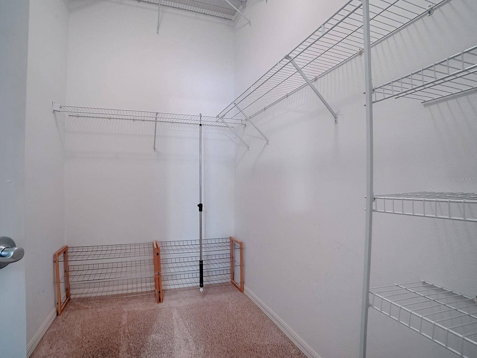 1530 BARNWELL PLACE, The Villages, FL 32162 Master bedroom has large walk in closet with extra storeage