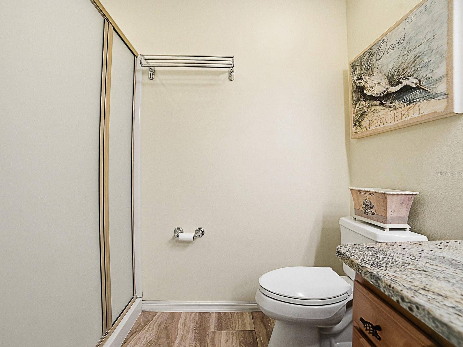 1530 BARNWELL PLACE, The Villages, FL 32162 Master bedroom -walk in shower