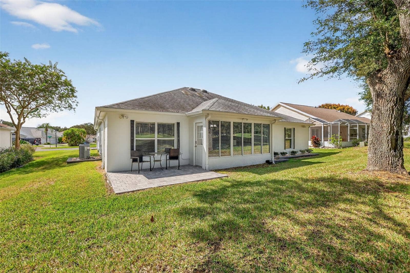 1201 BARCELONA DRIVE, The Villages, FL 32159 Rear and Side Elevation