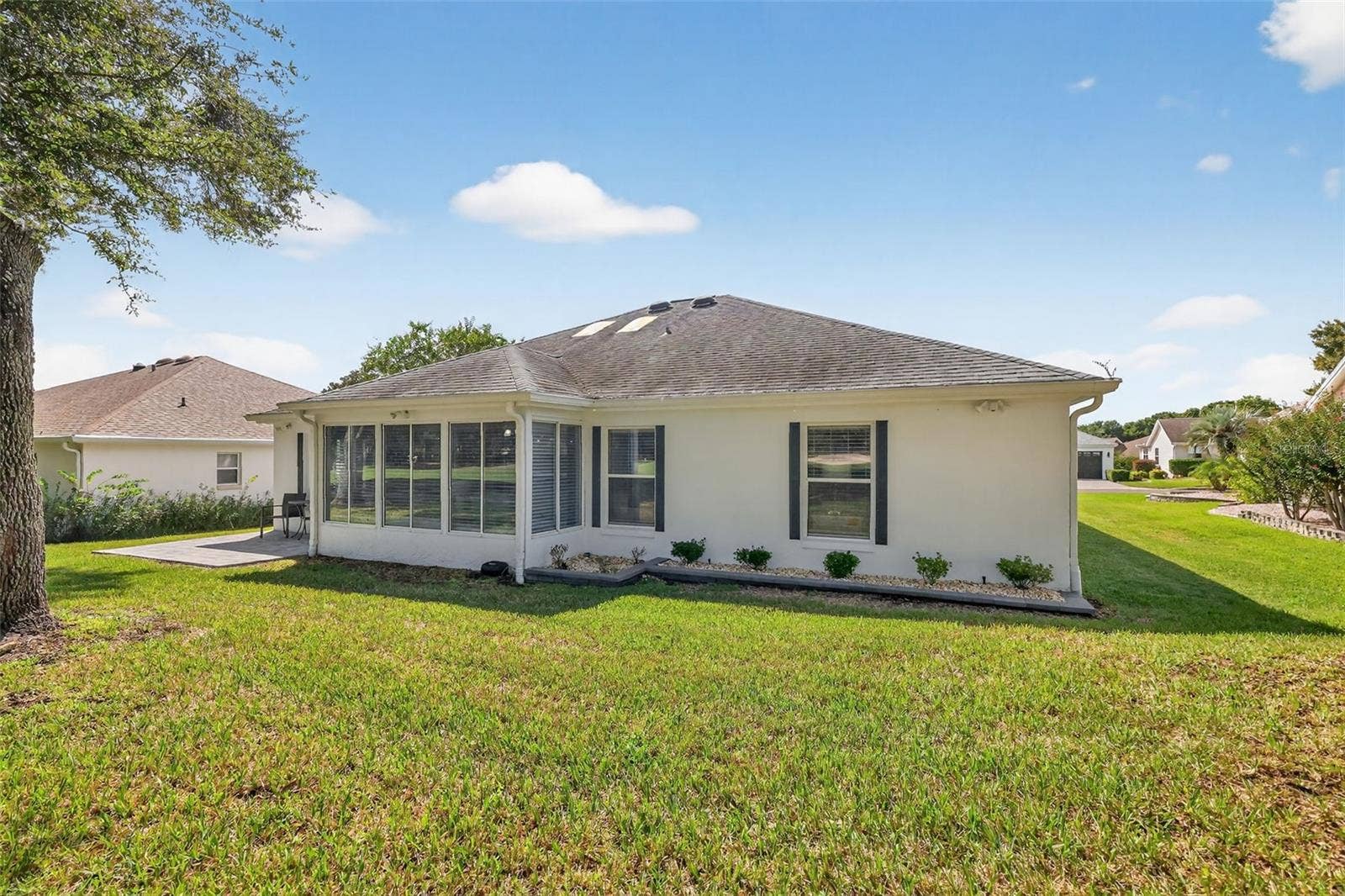 1201 BARCELONA DRIVE, The Villages, FL 32159 Rear and Side Elevation
