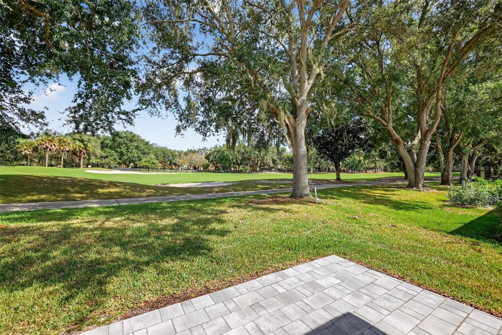 1201 BARCELONA DRIVE, The Villages, FL 32159 Rear Paver Patio Overlooking Golf Course