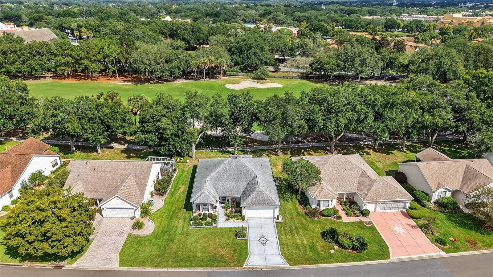 1201 BARCELONA DRIVE, The Villages, FL 32159 Aerial Front Elevation with Golf Front Views