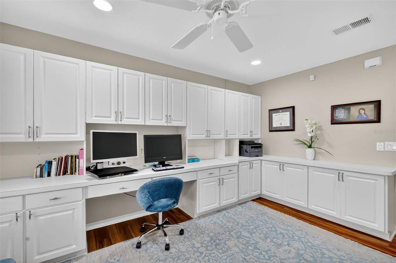 1201 BARCELONA DRIVE, The Villages, FL 32159 Third Bedroom with Custom Cabinetry and Built-In Desk