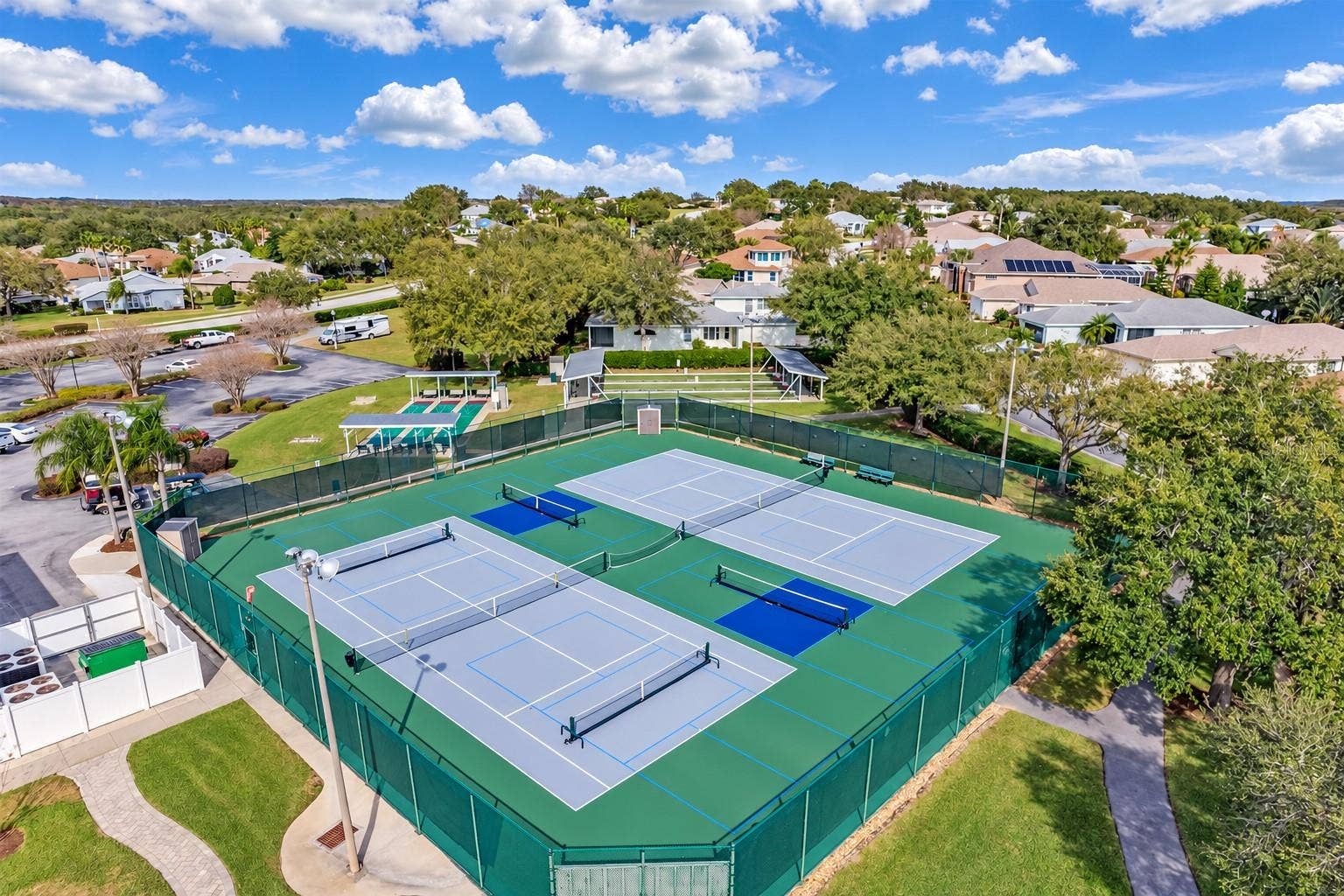 3210 SARATOGA DRIVE, Tavares, FL 32778 Pickleball or tennis? Enjoy a friendly match on Royal Harbors community courts