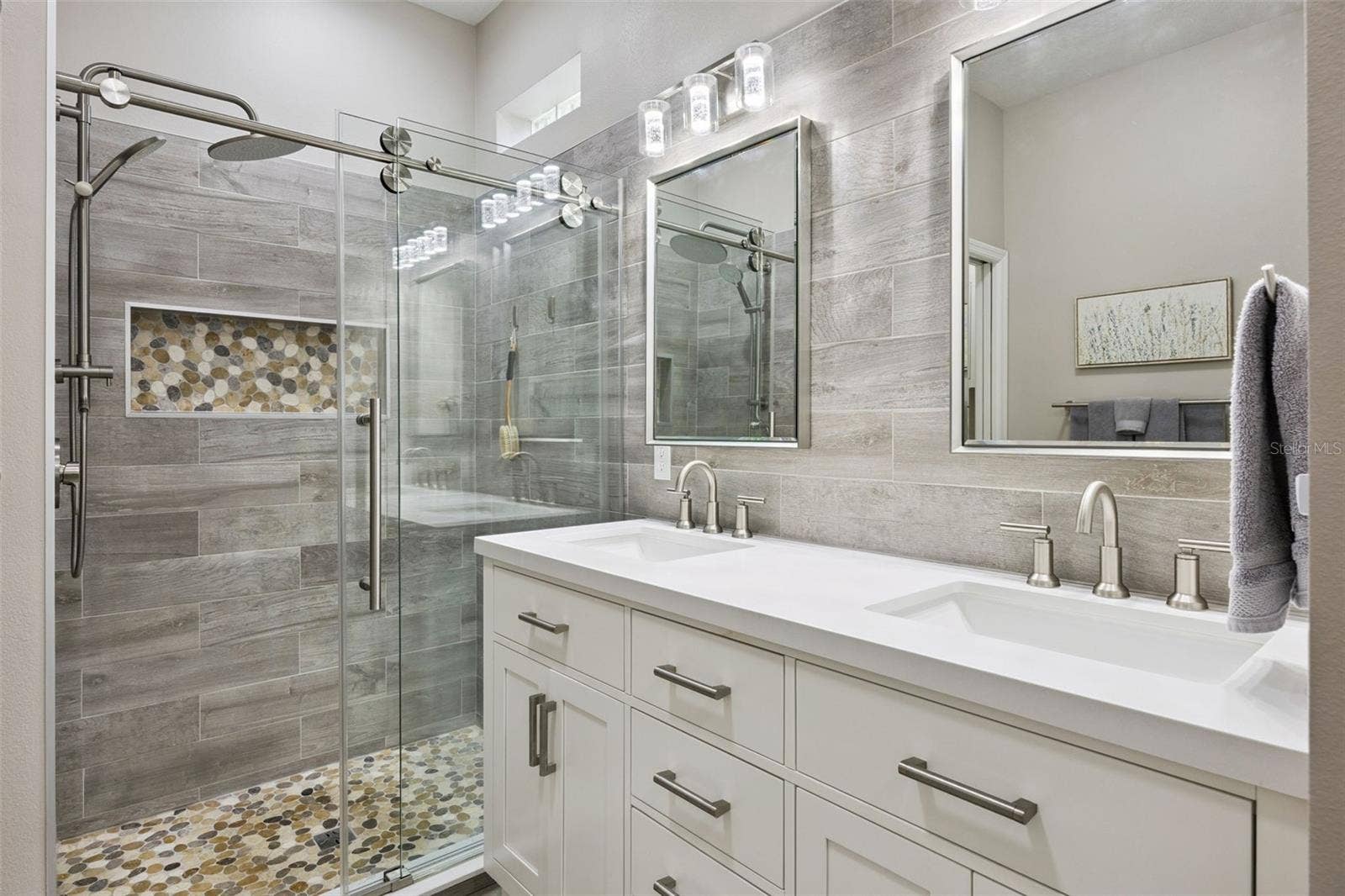 3210 SARATOGA DRIVE, Tavares, FL 32778 The primary bathroom received $6K in upgrades, including remodeled shower
