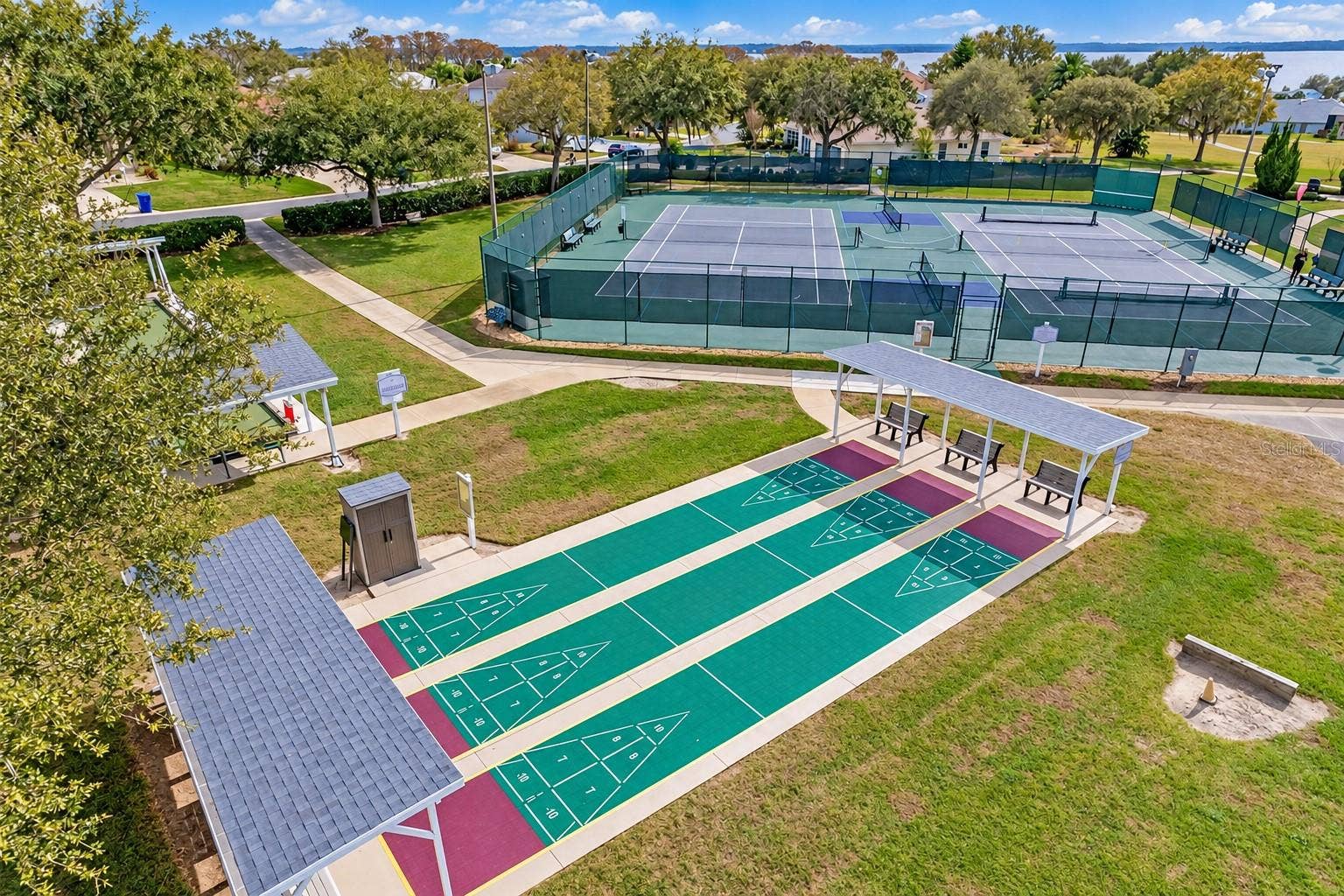 3210 SARATOGA DRIVE, Tavares, FL 32778 Enjoy a friendly game of shuffleboard and time with neighbors at Royal Harbor