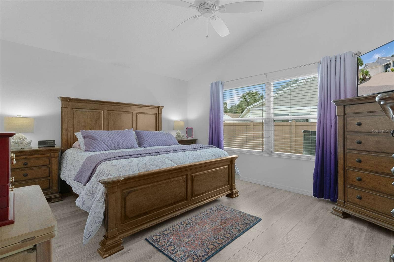 Primary bedroom has an ensuite with walk-in closet, Roman Shower & Private water closet