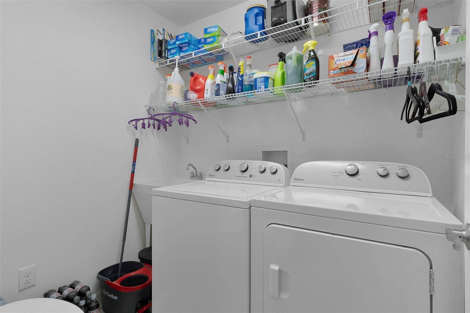 Laundry room with utility sink & aplliances are included